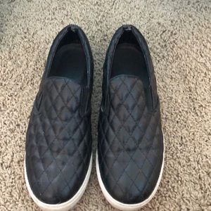 Slip on athletic shoes.